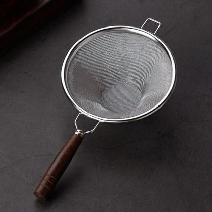 Portable tea infuser with wooden handle